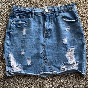 Ripped blue jean skirt